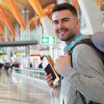 young man with backpack traveling